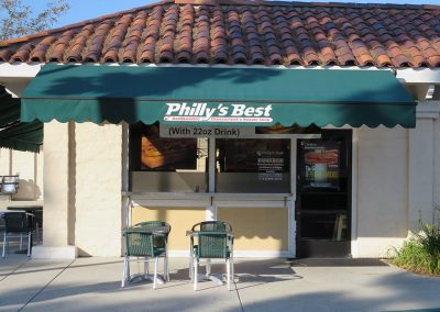 Green Retractable Awnings at Philly's Best